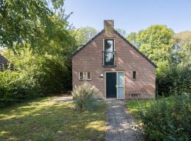 Zonnige luxe bungalow met grote tuin, bungalow in Ewijk