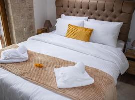 Snow Chalets Parnassos, hôtel à Kalívia