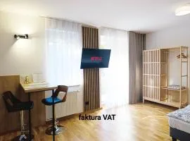 Kolory Warmii Apartamenty Biały i Szary