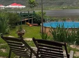 Quintal da prainha Pousada simples-beira da lagoa