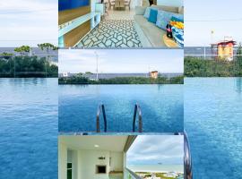 Apto em condomínio Pé na areia 3 Quartos Cozinha Completa Sacada com Churrasqueira Vaga de Garagem Piscina borda infinita Academia Quadra de esportes Sala de Jogos Summer Home Club acesso direto a praia, ξενοδοχείο σε Picarras