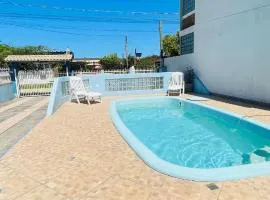 Casa com piscina perto da praia