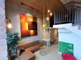 New York Style loft with computer gaming and bricks