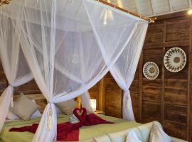 The National Park Villa with Joglo style villa and Jacuzzi, hotel in Pemuteran