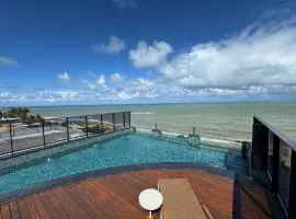 Flat beira-mar pé na areia com varanda