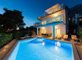 Villa ELLA ESTELLE with a heated pool, hot tub, sauna