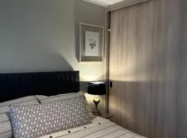 Estilo mariposa Central en distrito Icono