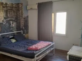 غرفه في فيلا بمنتجع النخيل التجمع الأول