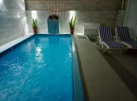 Sobrado aconchegante com Piscina Ar Condicionado 3 quartos a 150 metros do mar no Brejatuba