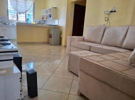 Indian ocean apartments you get the master bedroom with the private bathroom and the host sleeps in the other bedroom you share kitchen anc living room, homestay di Mombasa