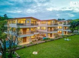 StayVista at Mount Brook with Mountain views, AC, Lawn