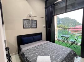 GR studio APARTMENT kompleks MUTIARA gua MUSANG, hotel in Gua Musang