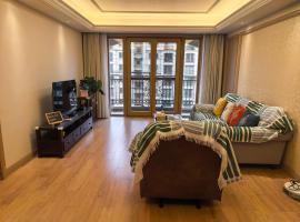 Tidewhisper Deluxe Suite 1 -2 Bedrooms, 2 Bathrooms, hotel v destinaci Čching-tao