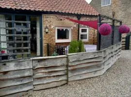 Larch Cottage Ruston with hot tub, dogs go free