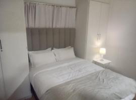 Andy's Place - The Village Blues Sandton, hotel con bañera de hidromasaje en Johannesburgo