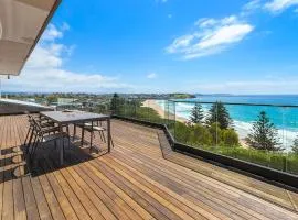 Morning Glow - Wake up to breathtaking views and golden sunrises at this serene coastal retreat.