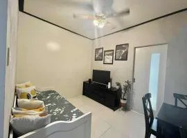 1BR with Balcony Cool Breeze Morning Sun by Cherisia's Hideaway