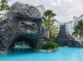 Grand Florida芭提雅带免费游泳池温泉和健身房和办公区水上花园公寓E208