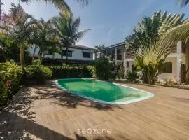 Aptos completos em cond. com piscina a 500m da Praia de Taperapuã - ENLs