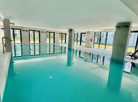 Rezydencja Niechorze 328 z Basenem i SPA Gratis - 5D Apartments، فندق في نيخوجة