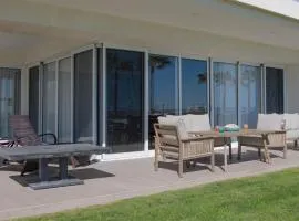 New and Amazing 3 bedroom Ground Floor Corner Beach Front Encantame C-101