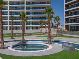 R202: Stylish 1-Bedroom Condo with Private Balcony, King Bedroom, and Relaxing Ocean Views