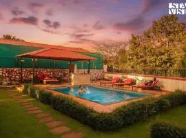 StayVista's Rustique Radiance - Hillside Retreat with Outdoor Pool & South Indian Architecture