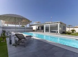 Villa Maria con piscina riscaldata