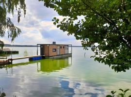 Hausboot Am See, Hotel in Rieth
