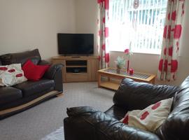 Classic one bed bungalow with views over the town, hotel en Exmouth