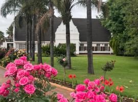 Madeley House Unit 2 near Oliver Tambo Airport, hotel en Boksburg