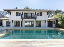 Villa Du Phare avec piscine chauffée pour 14 personnes, hotel en Cap-Ferret