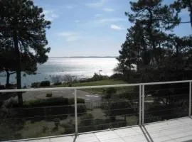 appartement Les pieds dans l'eau avec vue bassin