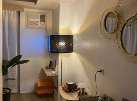 1-bedroom Modern Tropical Condo in Ortigas, Pasig, acomoda&ccedil;&atilde;o em condom&iacute;nio em Wasig
