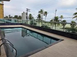 Apartamento pé na areia