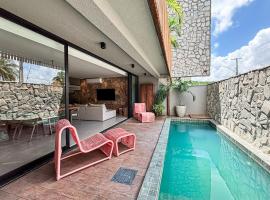 Casa 3 Suítes Piscina e Hidro para até 9 pessoas, Hotel in Tatuamunha