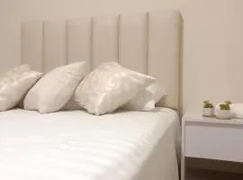 Posada Express Confort Check-In & Free Airport Taxi