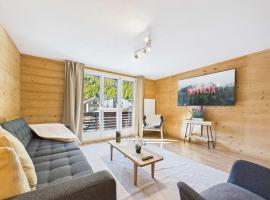 Family-friendly apartment with mountain views，位于萨斯格伦德的酒店