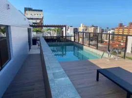 Flat encantador na praia de Intermares com piscina