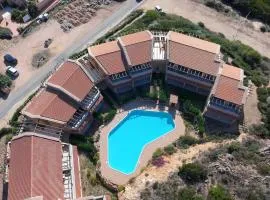 Casa Le Rocce con piscina condivisa