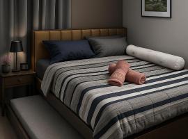 Seven-Eleven Inn 1BR Condo - Royal Oceancrest Mactan, acomoda&ccedil;&atilde;o em Mactan Island