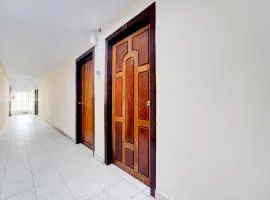 Super Hotel O Pathanamthitta Near Mahatma Gandhi Statue