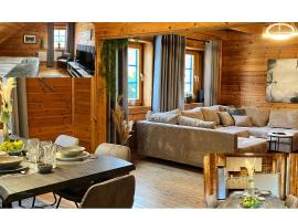 VINNEN LODGE - Die moderne Holzhaus Oase, hotel in Lähden