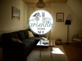 Ferienwohnung Peters、ヒューンフェルトのホテル