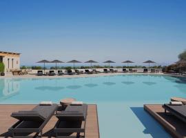 NĒRO Suites by NOMÉE Hospitality Group