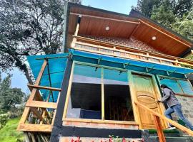 Caba&ntilde;a arcoiris del lago # 6, hotel con vasche idromassaggio a Pasto