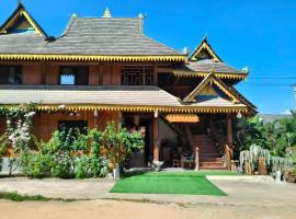 Jinghong Manyun Dai Village Inn, huisdiervriendelijk hotel in Jinghong