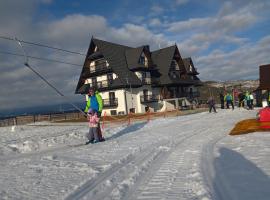 Aparthotel Rabiań-SKI 10metrów do wyciagu połączonego z całą Kotelnicą na miejscu wypoożyczalnia z serwisem，位于Białka Tatrzanska的酒店