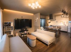 Noctis豊田 ジャグジー肩湯付お風呂75型TV 最大12名宿泊可能, hotel in Toyota