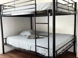 Chambre cozy avec lit double en étage